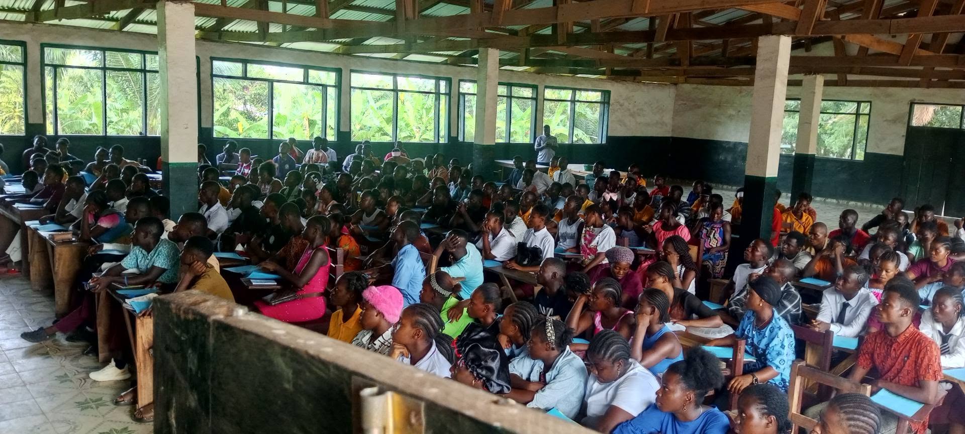 Students gathered in a classroom at Karn High School